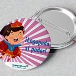 Crachá "¡Logopeda al poder!" Menina e menino