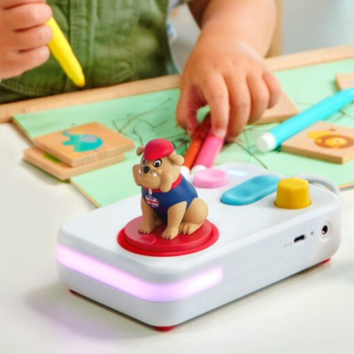 A child's hand holding a marker next to the FABA+ storyteller and the bulldog figure from the English songs