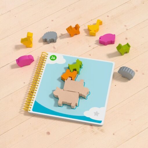Bao's Cloudland de HABA: trasera de la caja con los niveles de dificultad, juego de lógica de madera para niños
