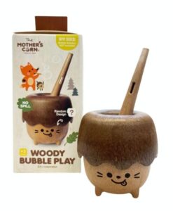 Pompero antiderrames Woody: caja Woody Bubble Play junto al pompero con su varita