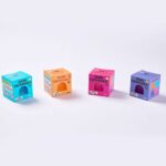 Gum Droppable de J'adore: las cuatro cajas de colores de la gama alineadas sobre fondo blanco