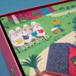 Puzzle de misterio de Londji: detalle de tres ovejas leyendo en un banco junto a un gato