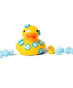 Pato squishy pegajoso Scrunchems: pato amarillo decorado con burbujas azules junto al patito mini y los pompones