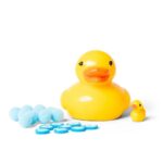 Pato squishy pegajoso Scrunchems: pato amarillo de frente junto a las burbujas, los pompones y el patito mini
