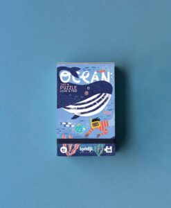 Puzzle del océano Tiny Puzzle Ocean: caja pequeña de frente con la ballena y el título Ocean