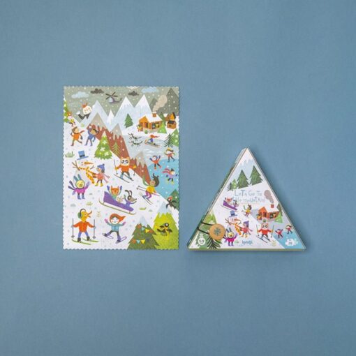 Puzzle reversible de montaña de Londji: cara de invierno montada junto a su caja triangular